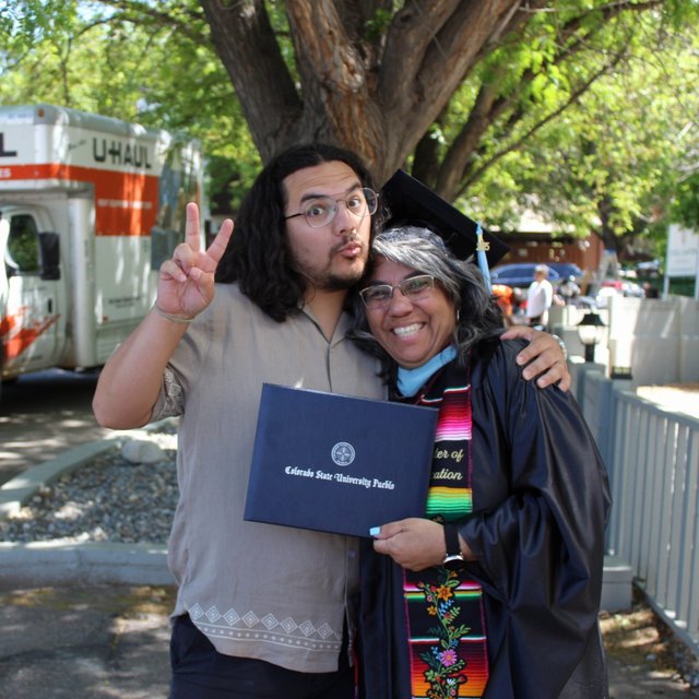 Josh with his mom at her graduation